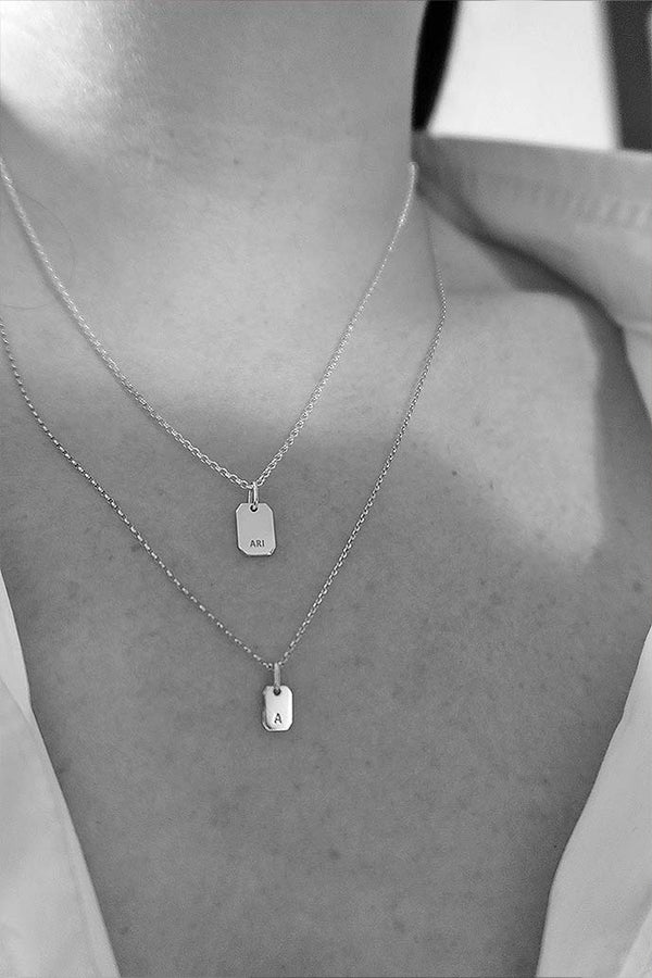 THE LOVE TAG LETTER SILVER NECKLACE